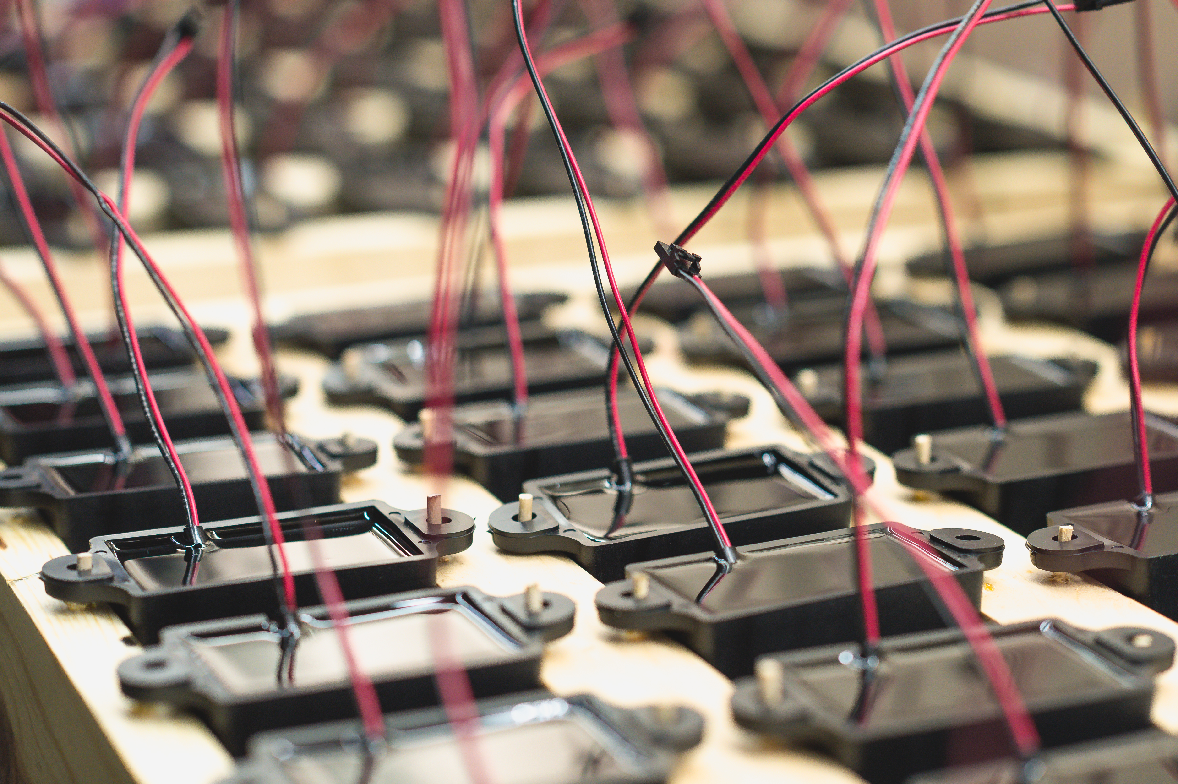 LCD screens that await installation into printed circuit boards.